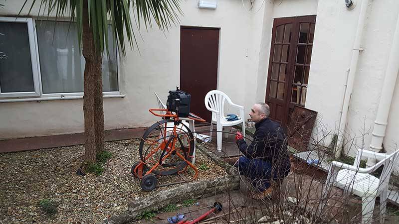 surveying a drain